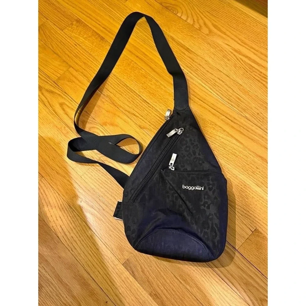 Baggallini Black Cheetah Print Sling Backpack Crossbody Travel Bag